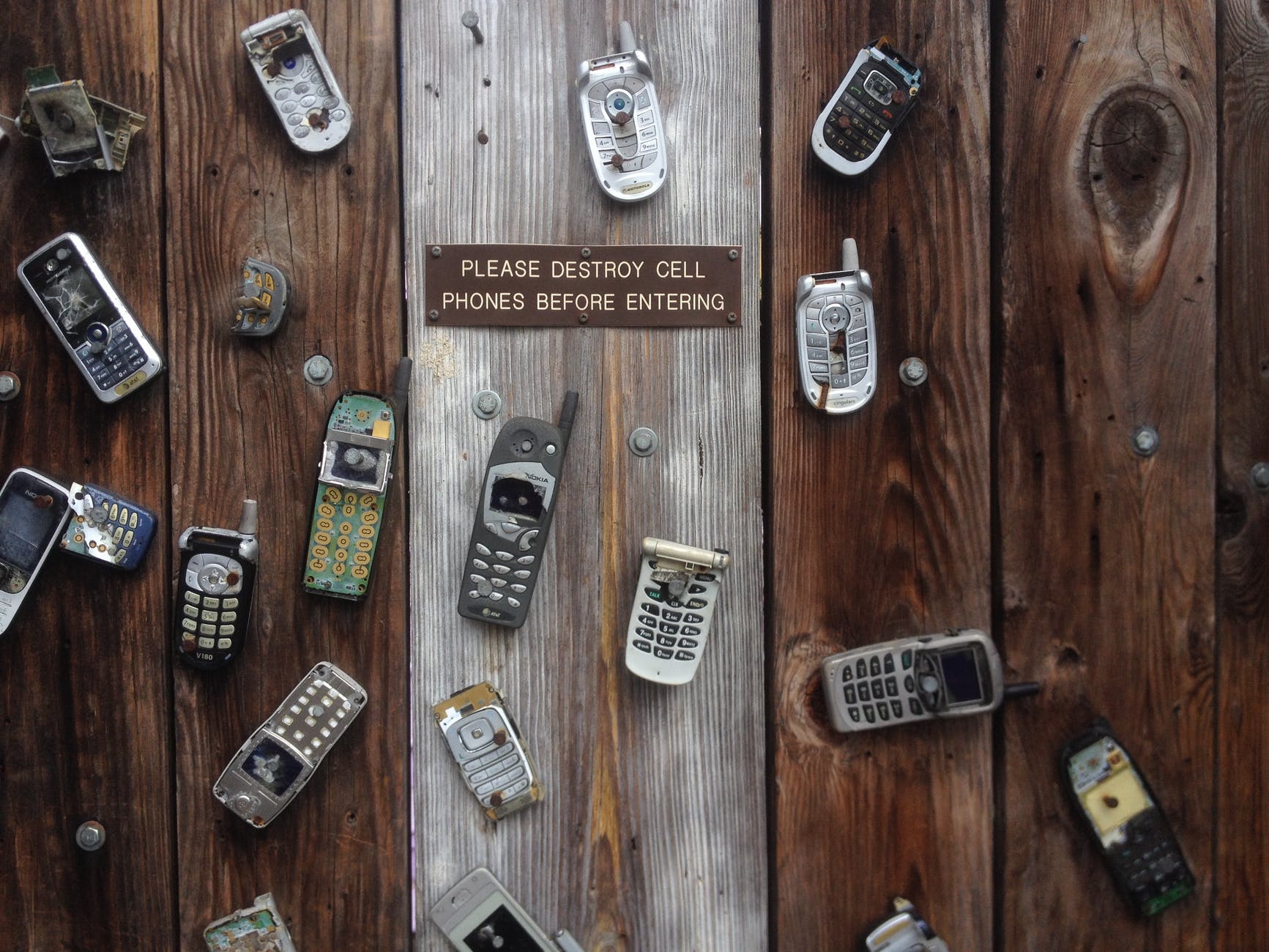 antique broken cell phone communication